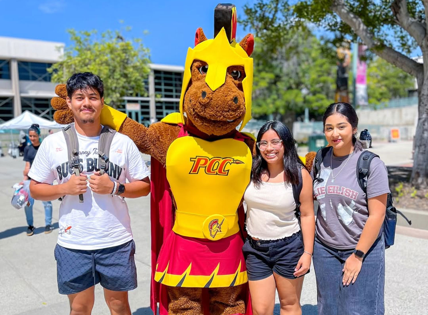 Students stand with larry lancer